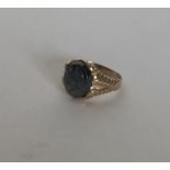 A gent's 9 carat signet ring with crested mount. A