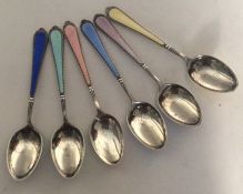 A set of six silver and enamel teaspoons. Birmingh