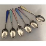 A set of six silver and enamel teaspoons. Birmingh