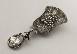 A Victorian silver caddy spoon attractively decora