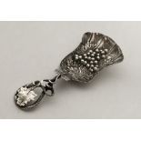 A Victorian silver caddy spoon attractively decora