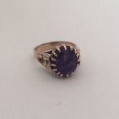 A 9 carat single stone ring in claw setting. Appro