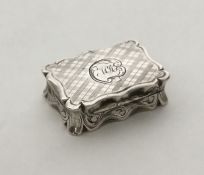 A Victorian silver hinged top vinaigrette with gil