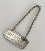 A rectangular Georgian silver wine label for 'Bran