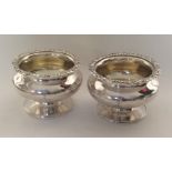 A good pair of Georgian circular silver salts with