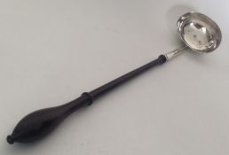A good quality Georgian silver toddy ladle, well p