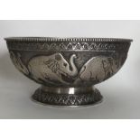 A heavy Indian silver bowl decorated with elephant