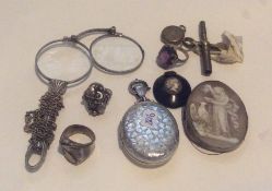 A silver locket, rings etc. Approx. £20 - £30.