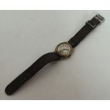 A gent's 9 carat wristwatch on leather strap. Appr