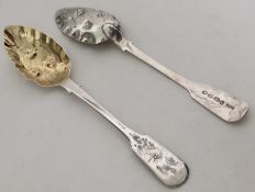 A pair of silver berry spoons with gilt bowls. Lon