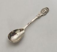 A rare Victorian silver mustard spoon decorated wi