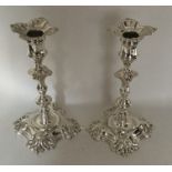 A good pair of cast George II silver candlesticks.