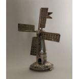 A novelty silver model of a windmill. Approx. 17 g