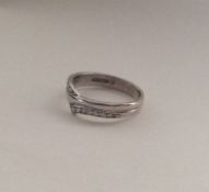 A diamond twist ring in 9 carat. Approx. 3.1 grams