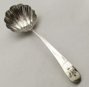 A Georgian silver ladle with fluted bowl. Approx.