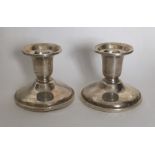 A pair of Sterling silver piano candlesticks. Appr