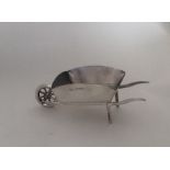 A novelty model of a wheelbarrow with dome mounts