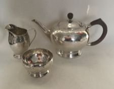 LIBERTY & CO: A rare three piece silver tea servic