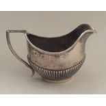 A small Edwardian silver cream jug. Birmingham. Ap