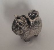 A Chinese silver model of a cat. Approx. 32 grams.