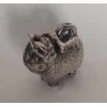 A Chinese silver model of a cat. Approx. 32 grams.