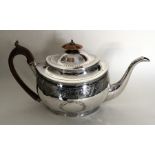 A good oval Georgian silver bright cut teapot with