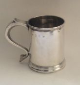A George I silver cup on spreading pedestal foot.