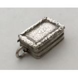 An unusual rectangular silver gilt vinaigrette wit