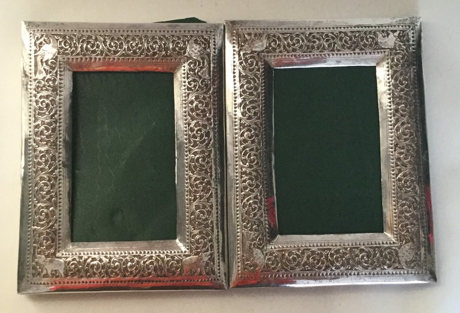 A rare pair of Indian rectangular frames decorated