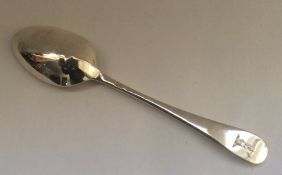 A Georgian Hanoverian pattern silver spoon with cr