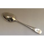A Georgian Hanoverian pattern silver spoon with cr