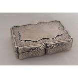 A heavy Georgian silver snuff box engraved with fl