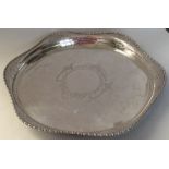 A heavy Edwardian silver two handled tray with gad