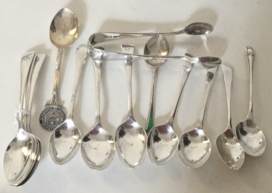 A bag containing silver teaspoons. Various dates a