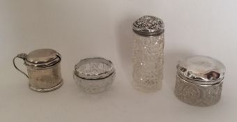 A collection of silver and cut glass dressing tabl