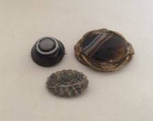 A banded agate gilt brooch together with two other