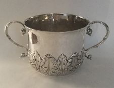 A rare Charles II silver porringer. Original initi