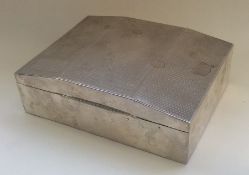 A good quality engine turned silver cigarette box