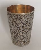 A fine quality Islamic silver beaker decorated wit