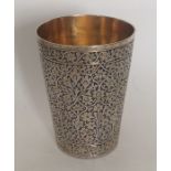A fine quality Islamic silver beaker decorated wit