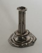 A Queen Anne silver miniature candlestick. London