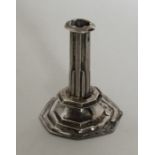 A Queen Anne silver miniature candlestick. London