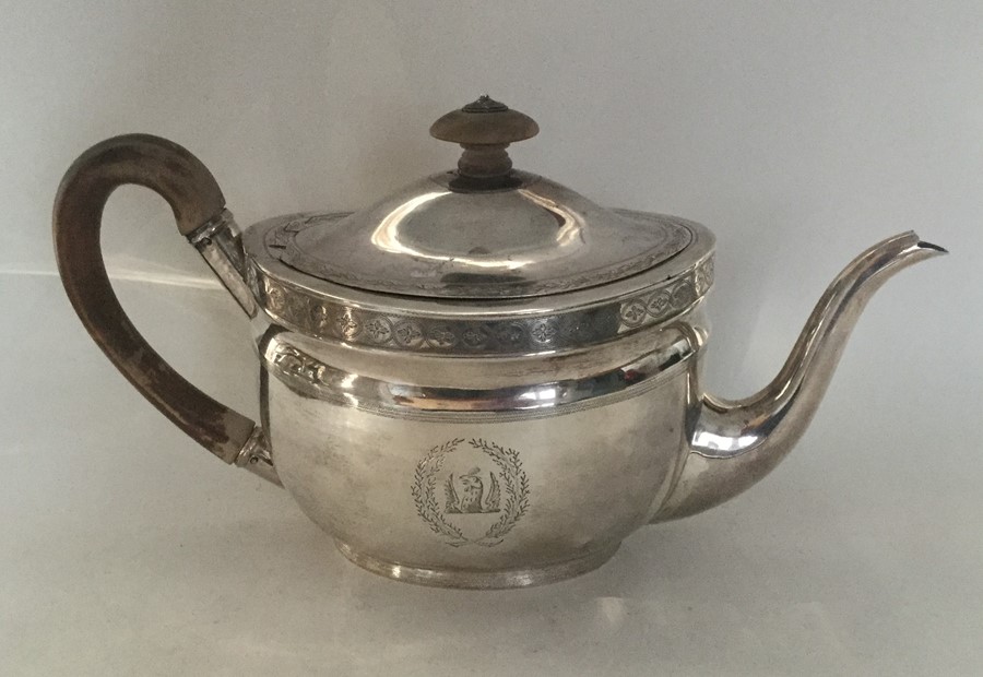 A good oval Georgian silver bright cut teapot. Lon