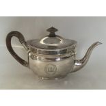 A good oval Georgian silver bright cut teapot. Lon