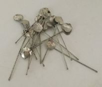 An unusual set of eighteen Eastern silver spoons w