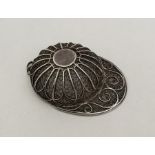 An 18th Century silver filigree caddy spoon in the