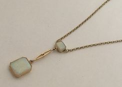 An attractive opal two stone drop pendant with cut