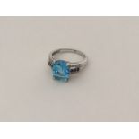 A large blue topaz, sapphire and diamond ring. App