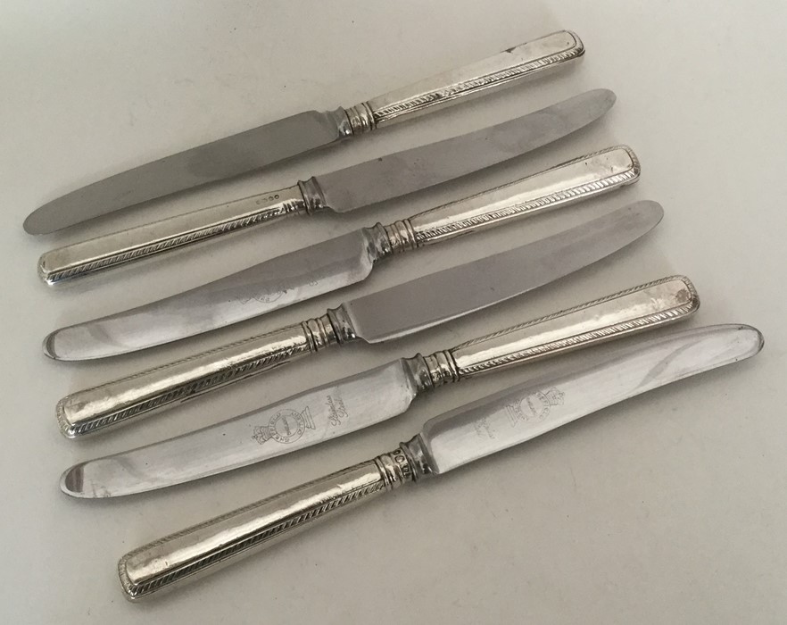 A good set of six Victorian silver handled knives.