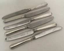 A good set of six Victorian silver handled knives.